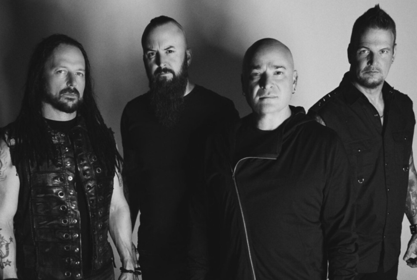 The band Disturbed, with members Dan Donegan, Mike Wengren, David Draiman and John Moyer.